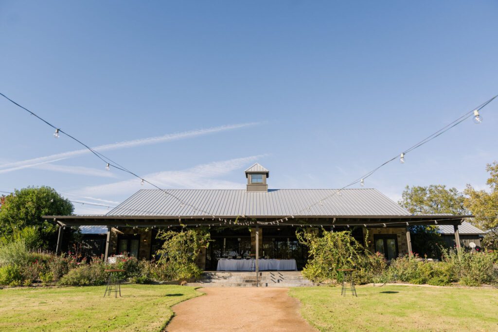 Outdoor reception space with string lights