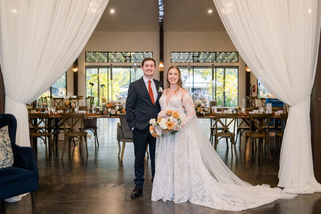 Bride and groom inside their wedding reception at Pecan Springs Ranch