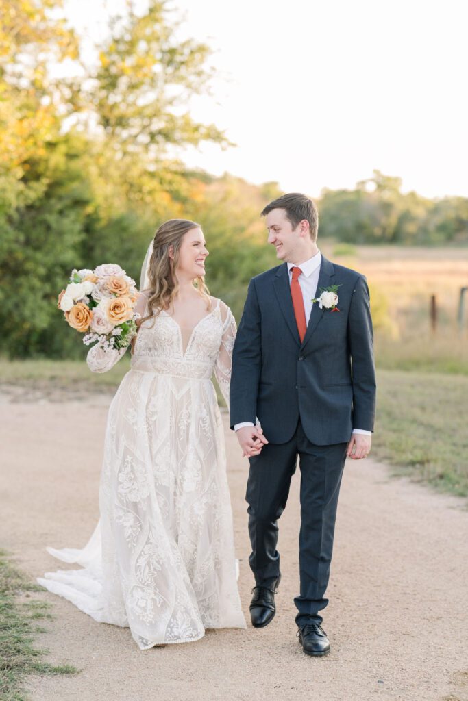 Newlyweds walking hand in hand