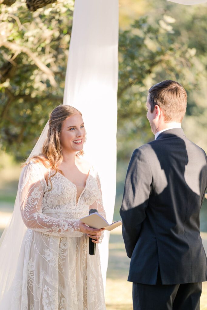 Bride and groom during their outdoor ceremony