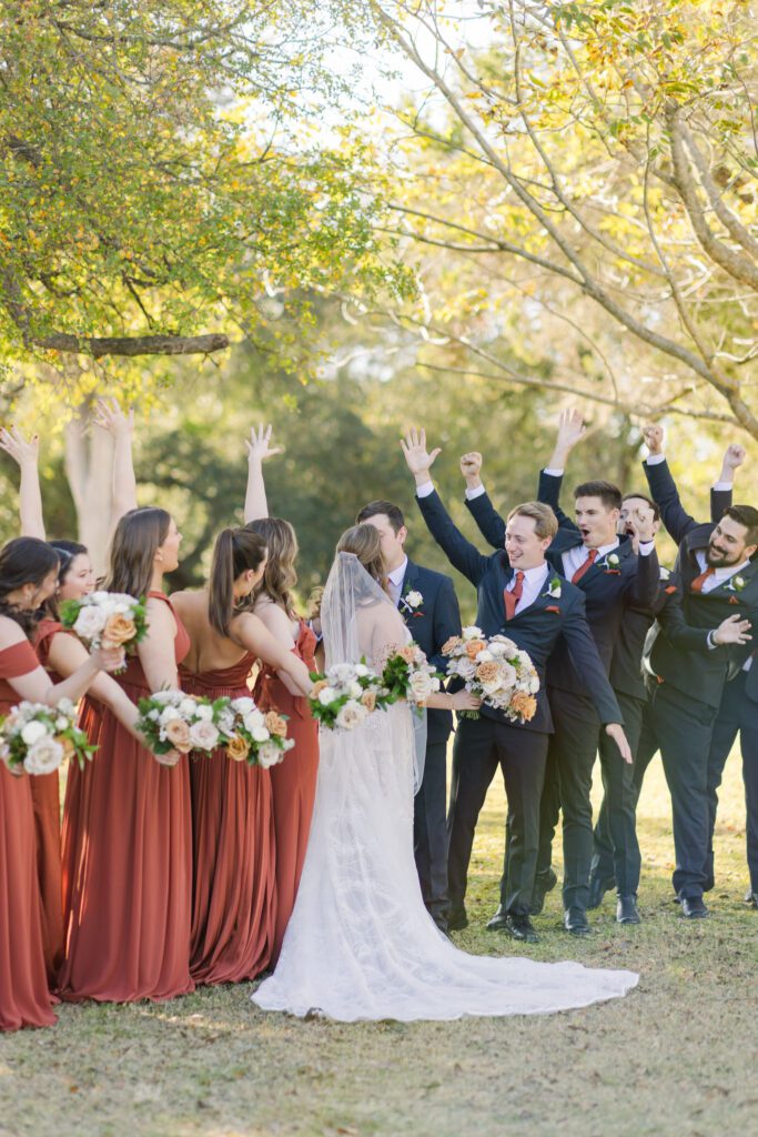Wedding party celebrating outdoors