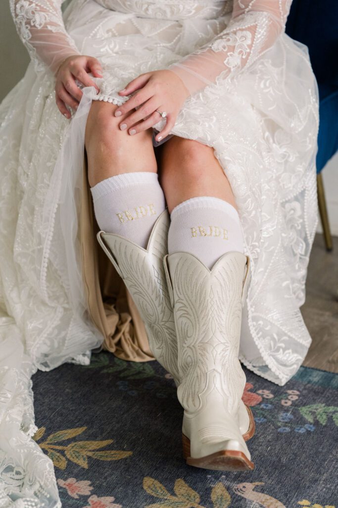 Bride wearing cowboy boots and bride socks
