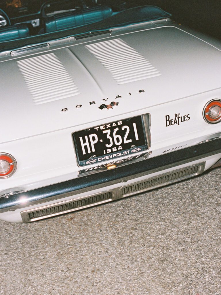 White vintage Corvair getaway car